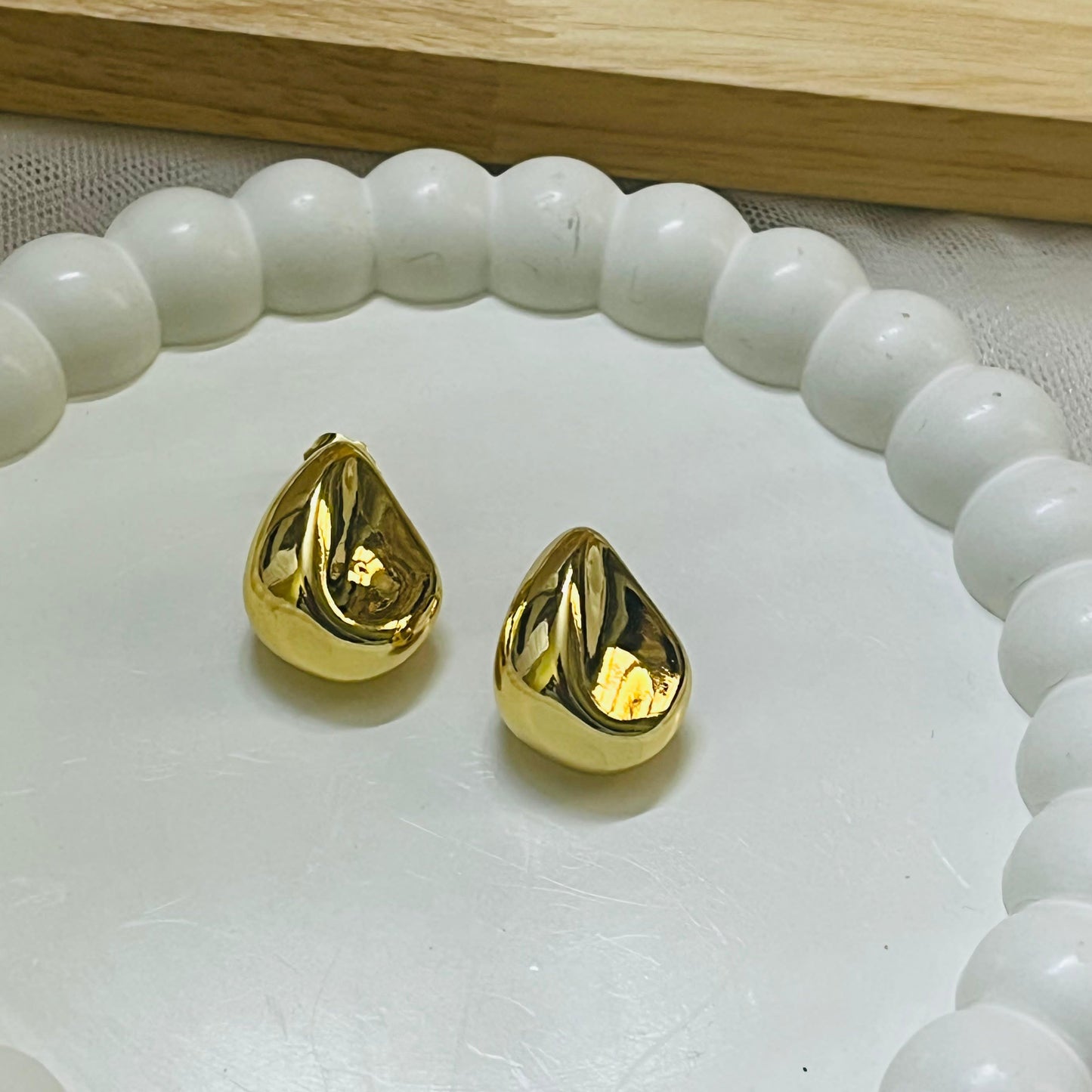 Glossy Teardrop Gold Studs