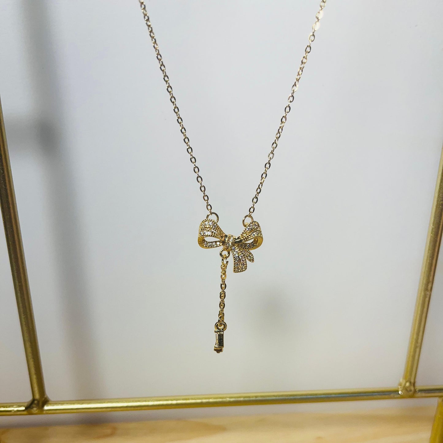 Voylla Scintillating Bow Charm Necklace